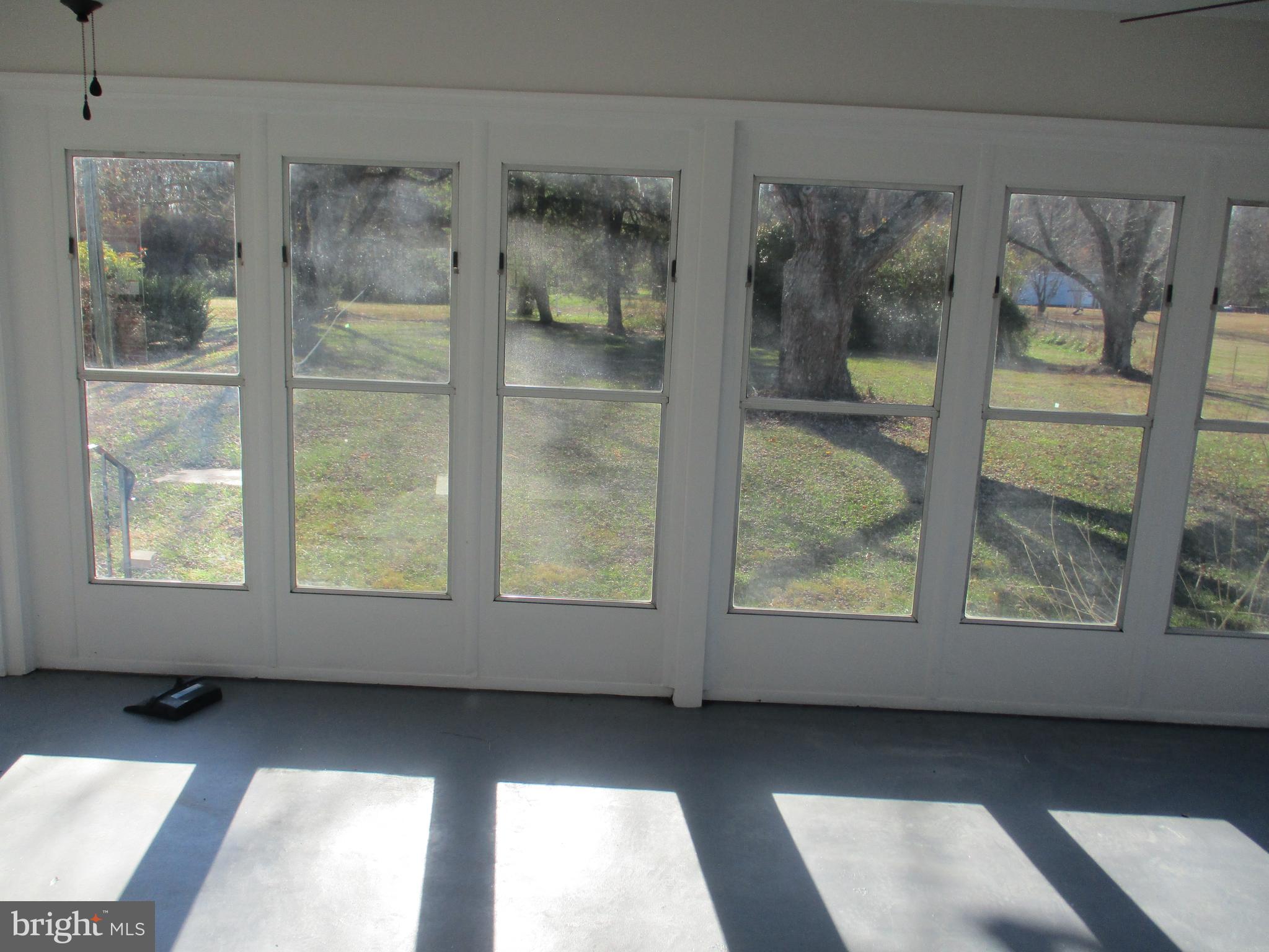 22403 Marsh Creek Road Preston, MD 21655 - Photo 14 of 35 a view of an empty room and window