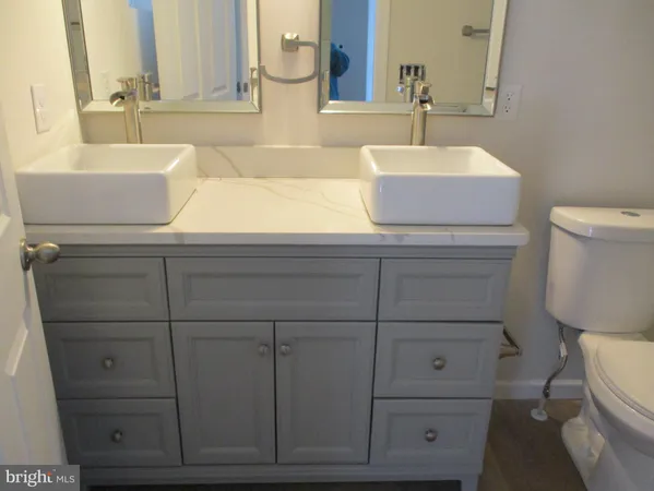 a bathroom with a sink and a toilet