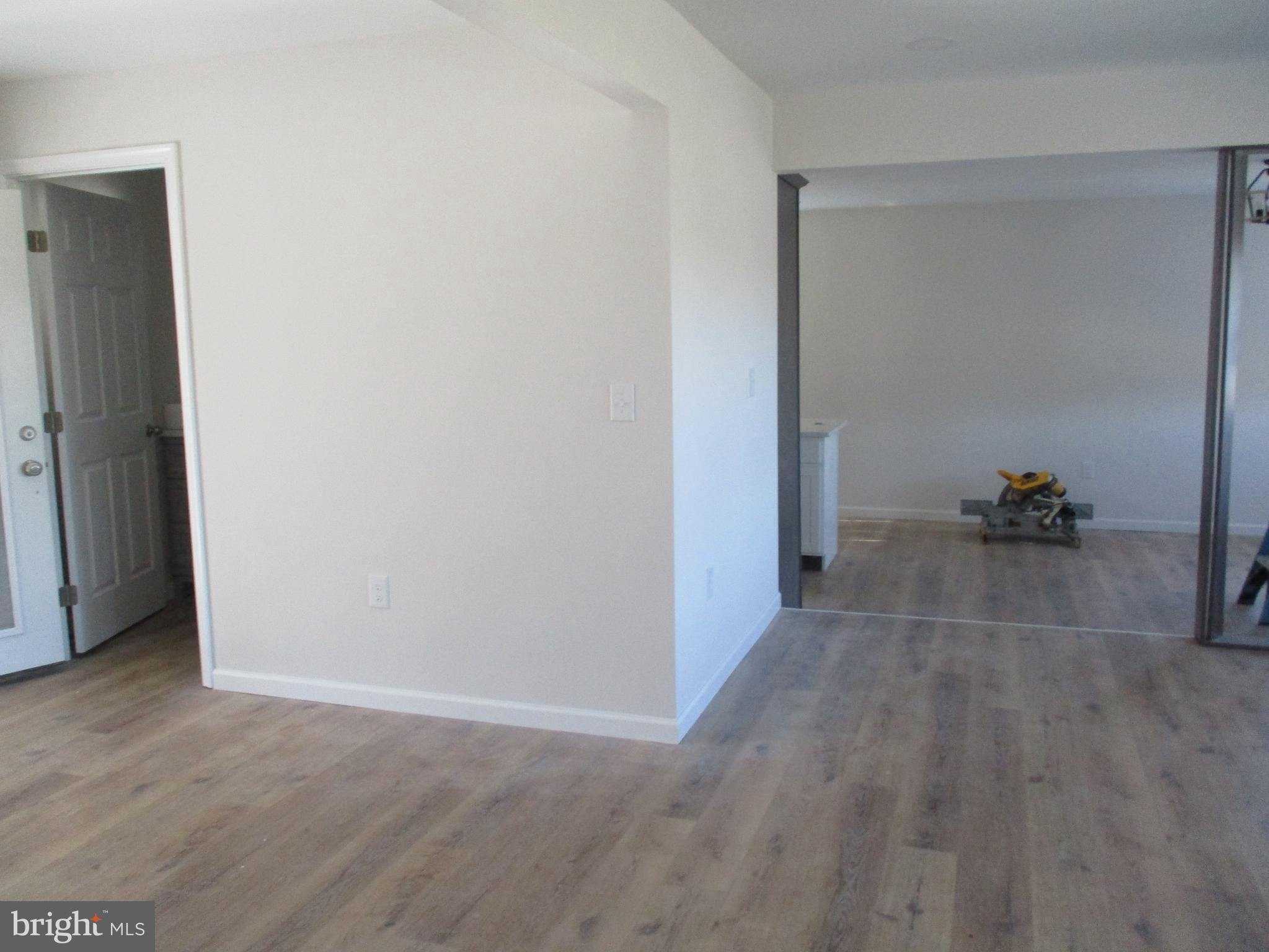 22403 Marsh Creek Road Preston, MD 21655 - Photo 32 of 35 a view of a room with wooden floor