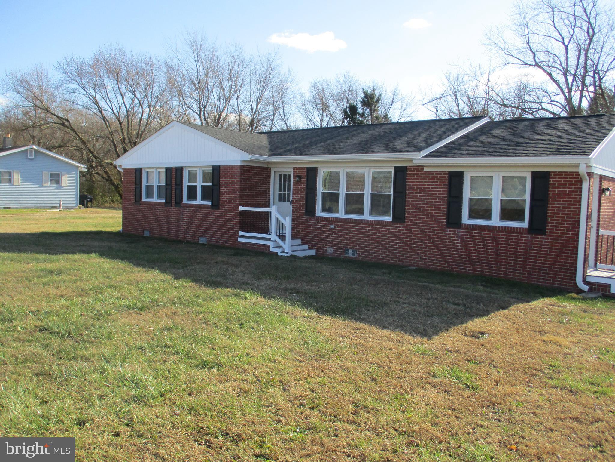 22403 Marsh Creek Road Preston, MD 21655 - Photo 34 of 35 a front view of a house with yard