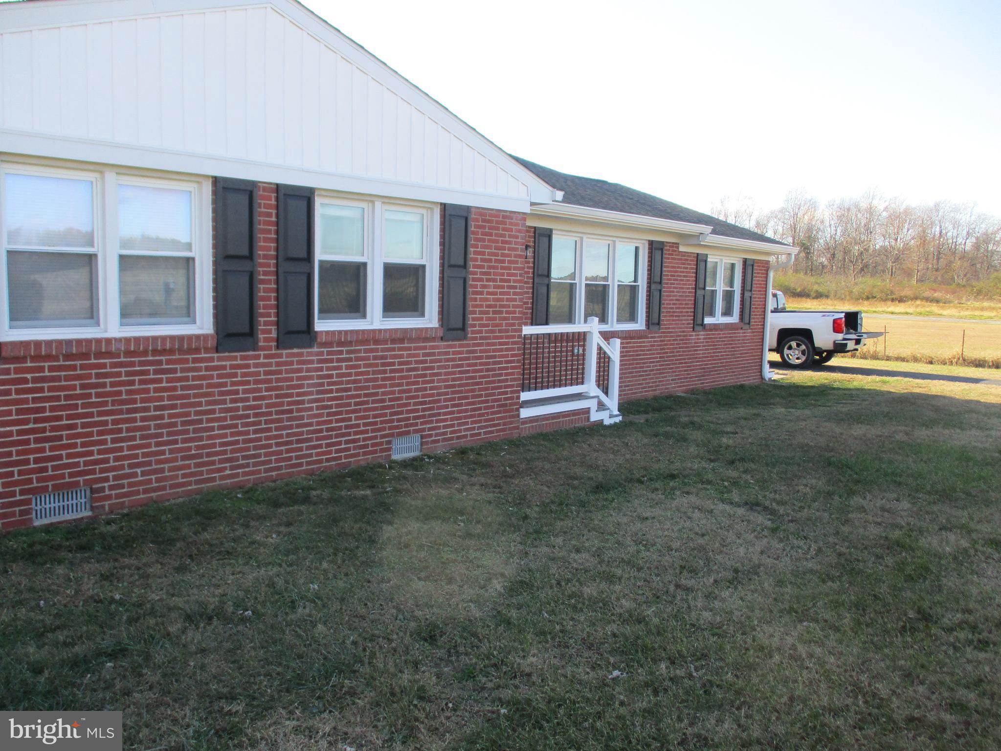 22403 Marsh Creek Road Preston, MD 21655 - Photo 35 of 35 a view of a house with a yard and sitting area