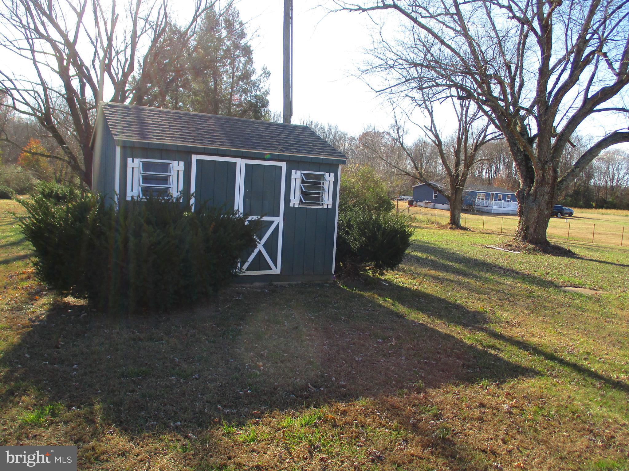 22403 Marsh Creek Road Preston, MD 21655 - Photo 7 of 35 a view of a house with a yard