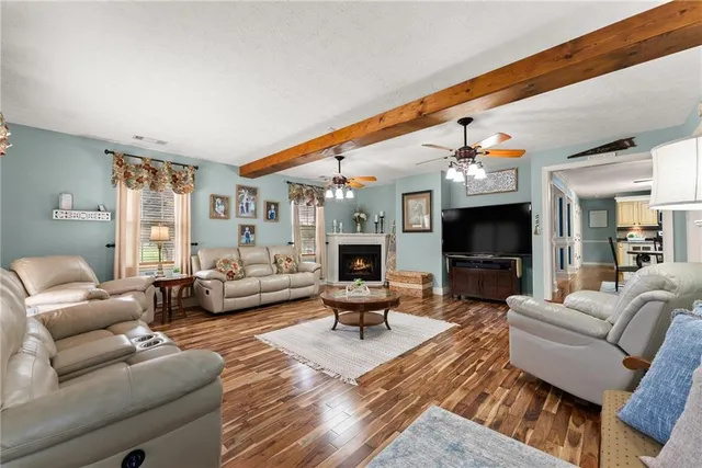 a bedroom with a bed furniture and a window