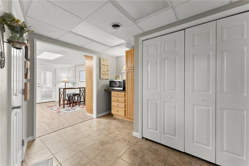 8958 Bill Savage Road Lula, GA 30554 - Photo 47 of 81 a view of a livingroom with kitchen and furniture
