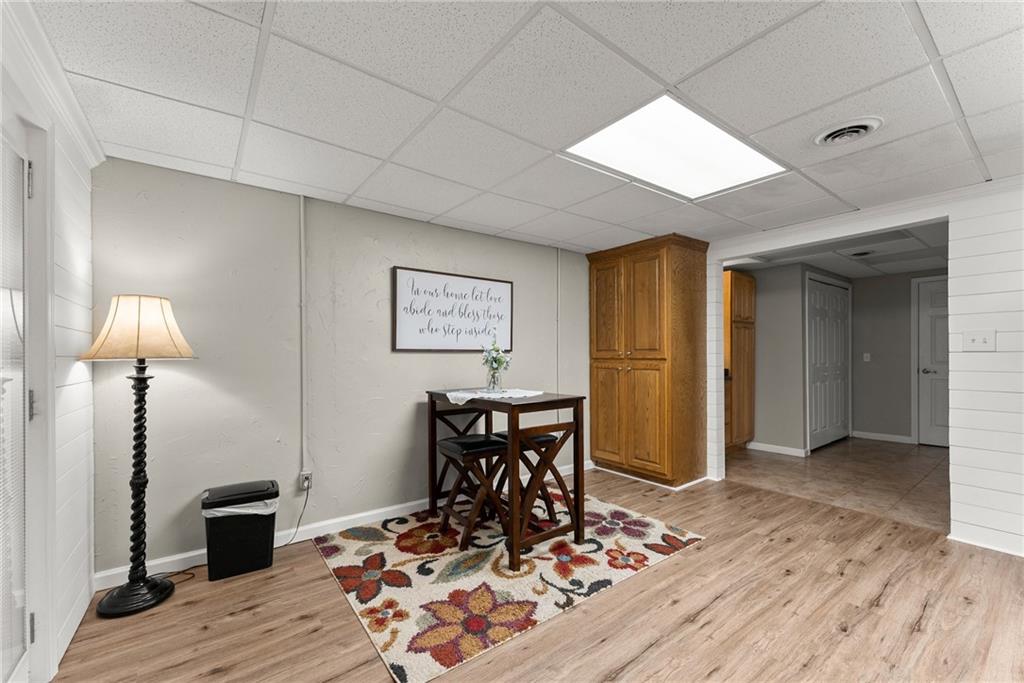 8958 Bill Savage Road Lula, GA 30554 - Photo 50 of 81 a view of a livingroom with furniture and wooden floor