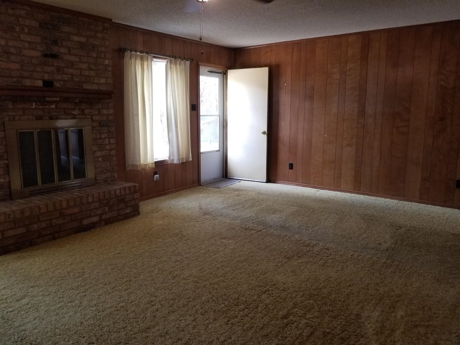 5314 22nd Street Lubbock, TX 79407 - Photo 7 of 10 a view of a room with a balcony and window