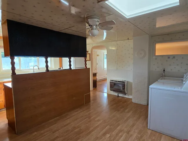 a view of a living room with a flat screen tv