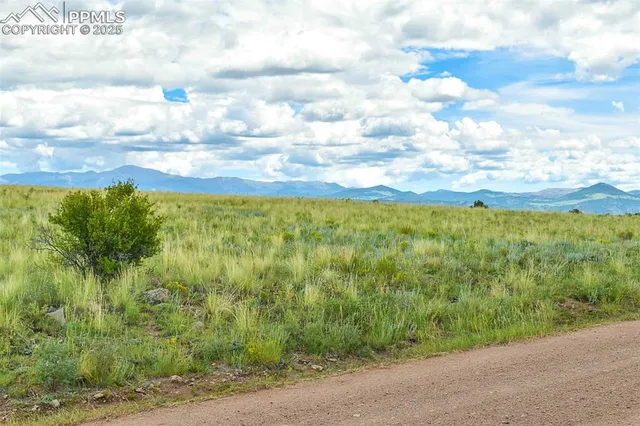 a view of a lake with a big yard