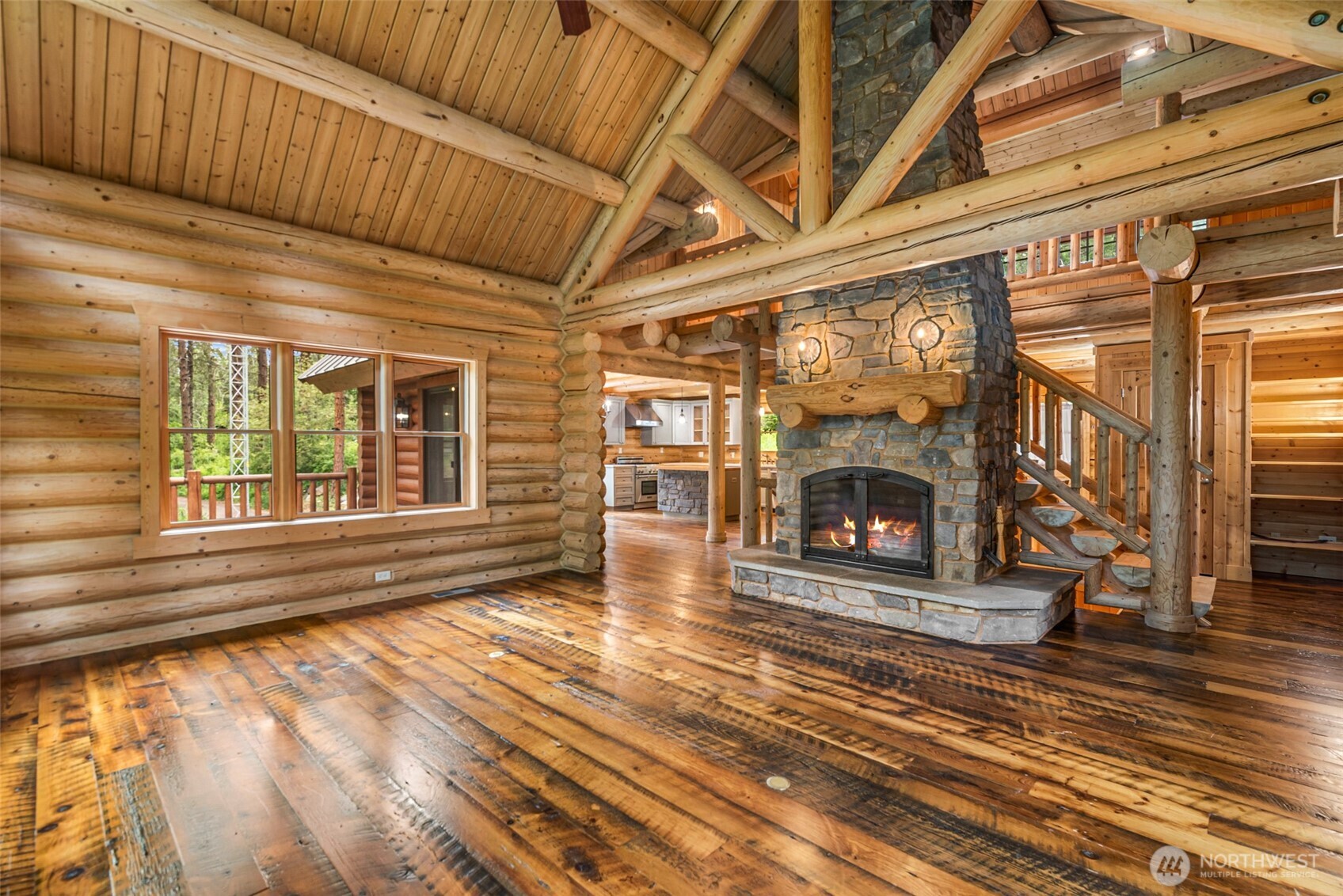 3888 Camas Creek Road Peshastin, WA 98847 - Photo 13 of 40 a view of an empty room with wooden floor and a window