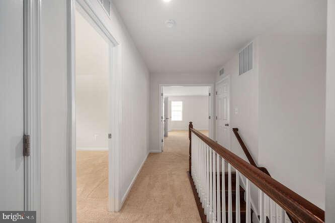 15858 Aerial View Road Woodbridge, VA 22193 - Photo 16 of 30 Upper level Hallway leads to Owners Retreat
