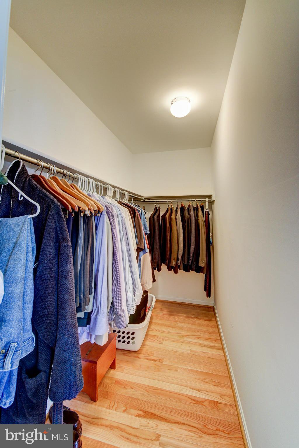 1258 Weatherstone Court Reston, VA 20194 - Photo 14 of 24 a view of walk in closet with clothes