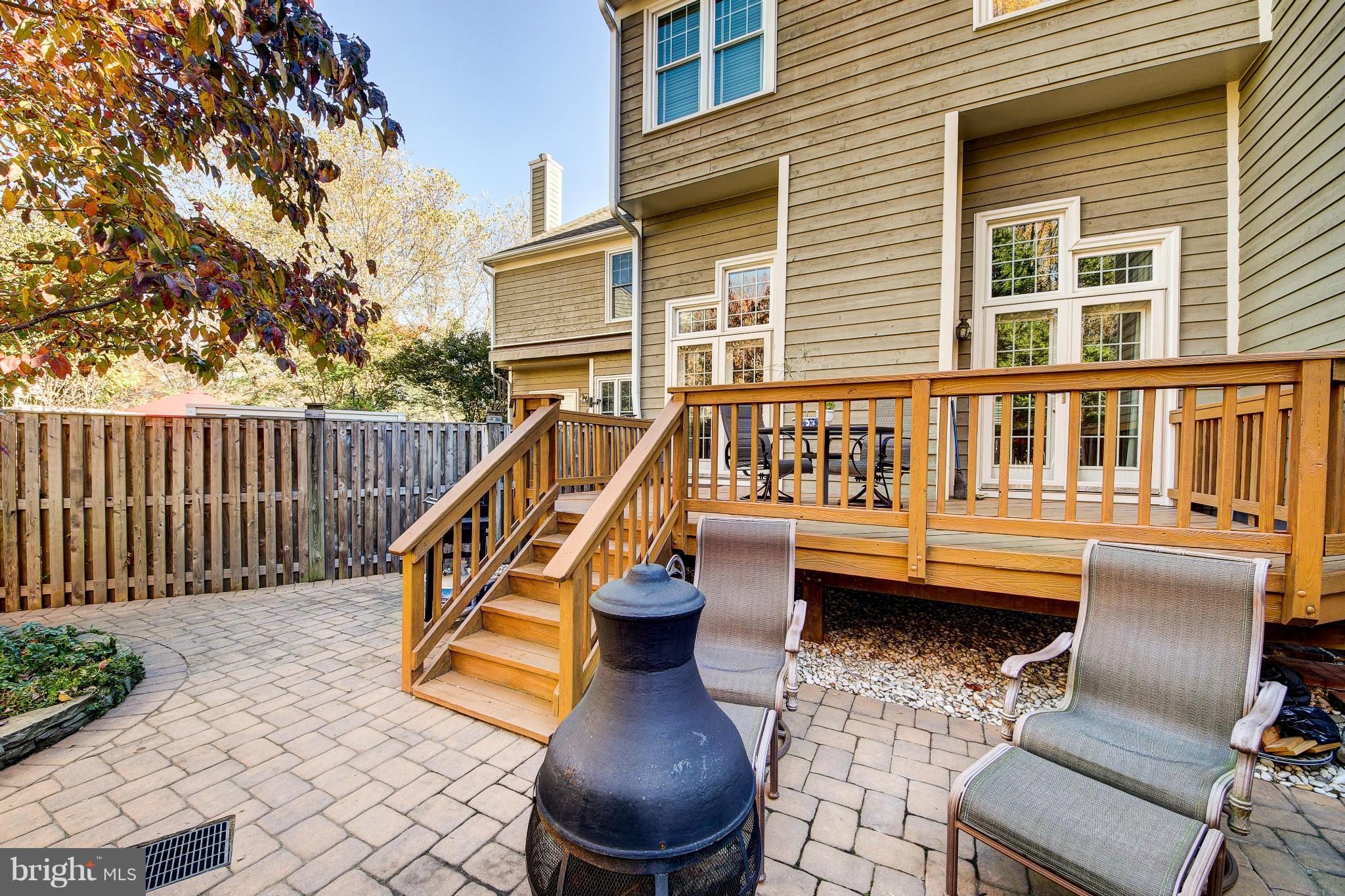 1258 Weatherstone Court Reston, VA 20194 - Photo 20 of 24 a view of a house with a deck and furniture