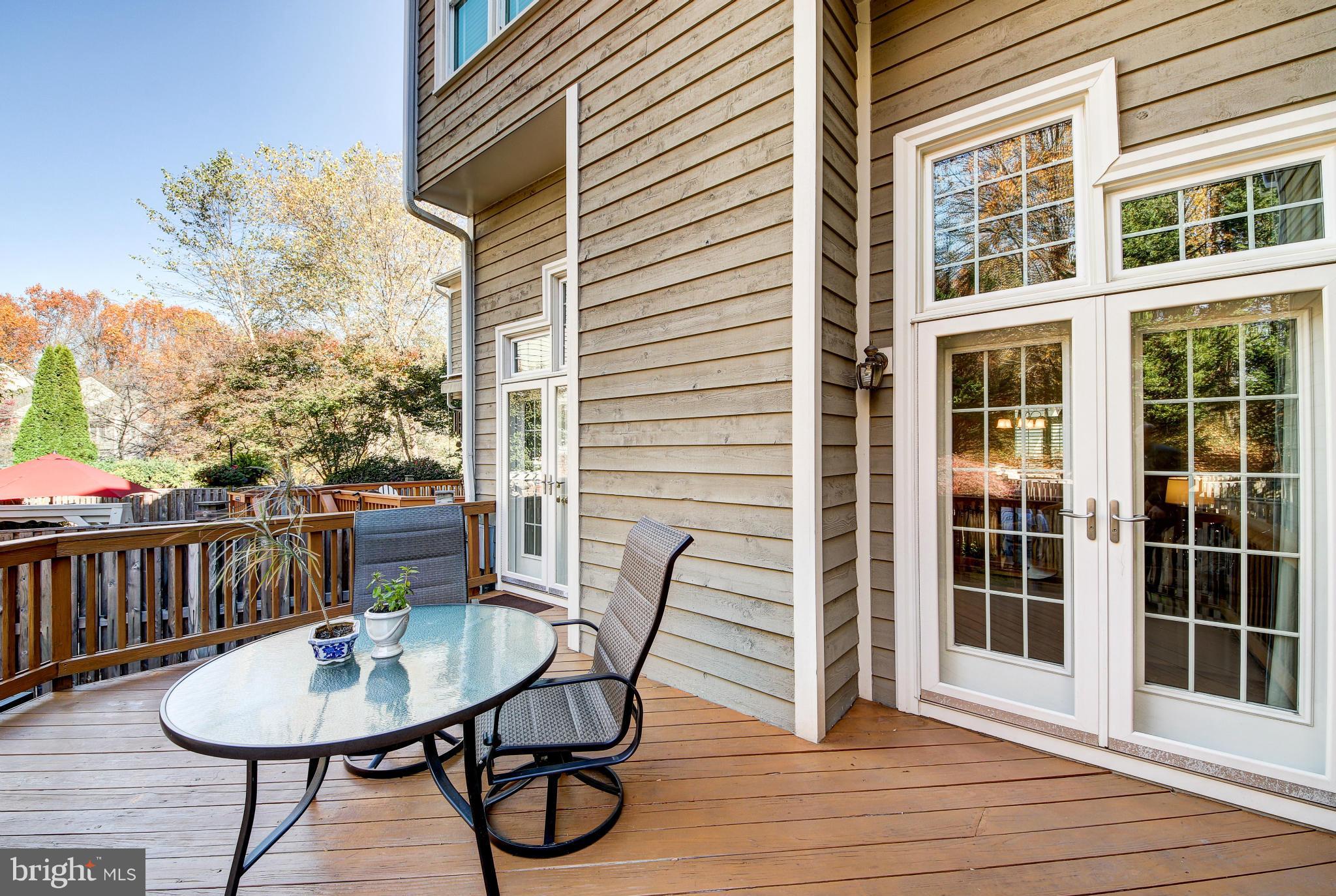 1258 Weatherstone Court Reston, VA 20194 - Photo 24 of 24 a balcony with table and chairs