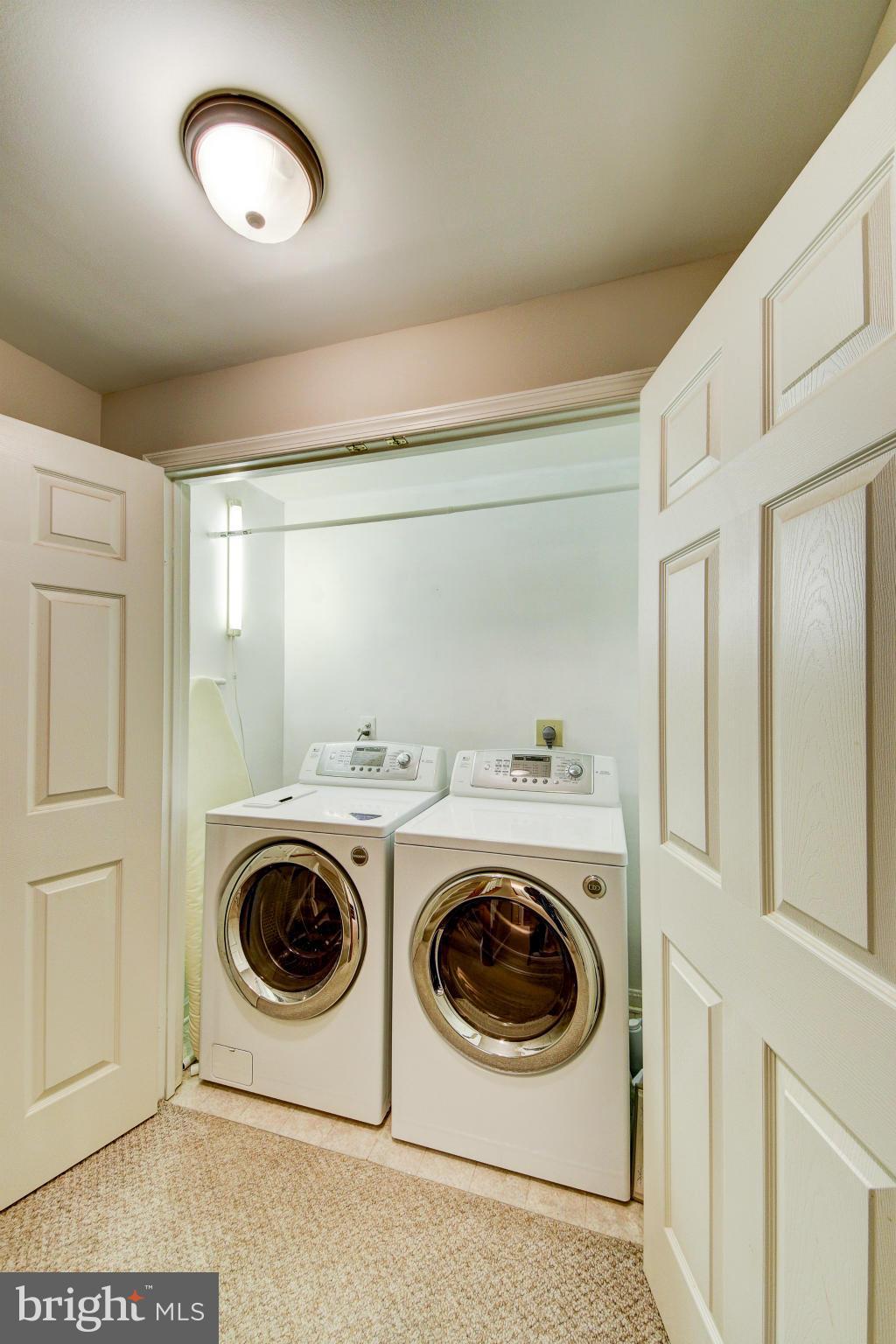 1258 Weatherstone Court Reston, VA 20194 - Photo 9 of 24 a utility room with dryer and washer