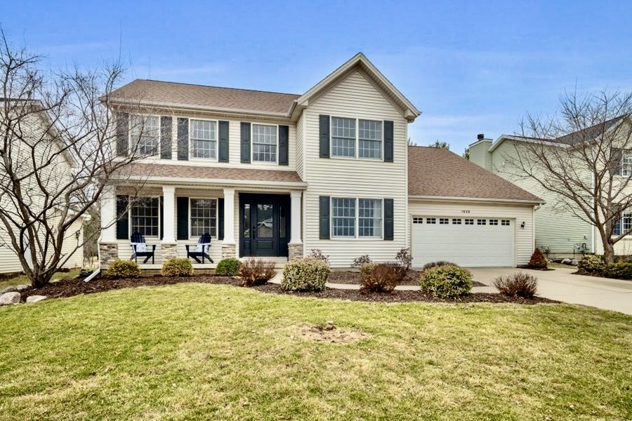 1629 Cheyenne Lane Normal, IL 61761 - Photo 1 of 26 a front view of a house with outdoor seating