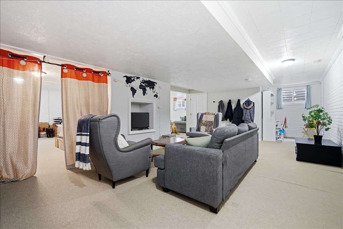 1629 Cheyenne Lane Normal, IL 61761 - Photo 23 of 26 a living room with furniture and a fireplace