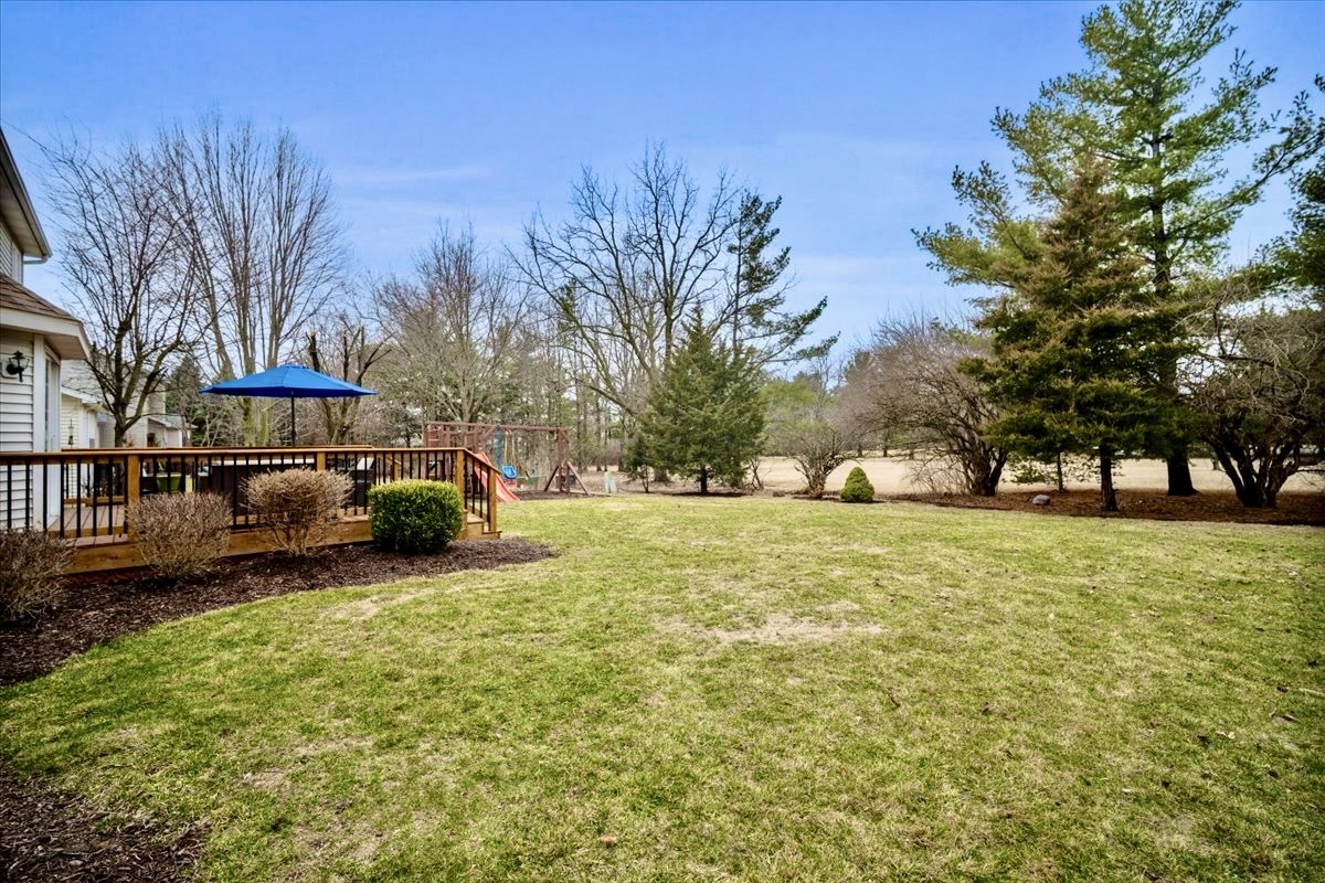 1629 Cheyenne Lane Normal, IL 61761 - Photo 25 of 26 a view of a yard with a house in the background