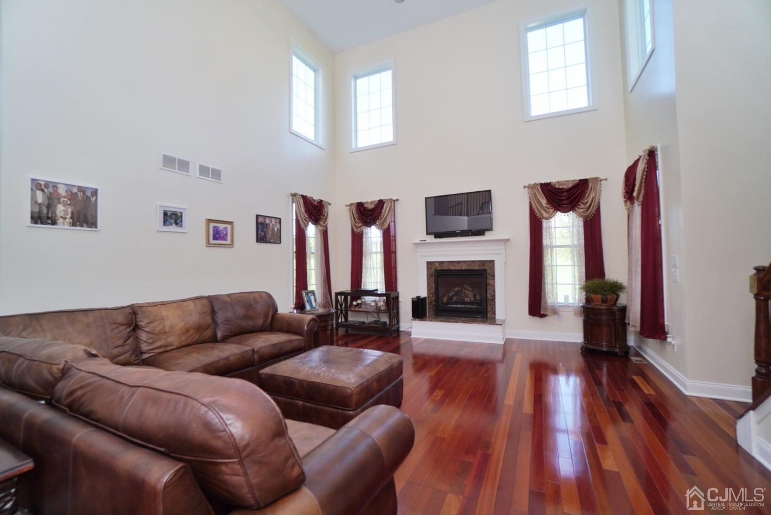 12 High Ridge Lane Augusta, NJ 07822 - Photo 22 of 49 a living room with furniture fireplace and wooden floor