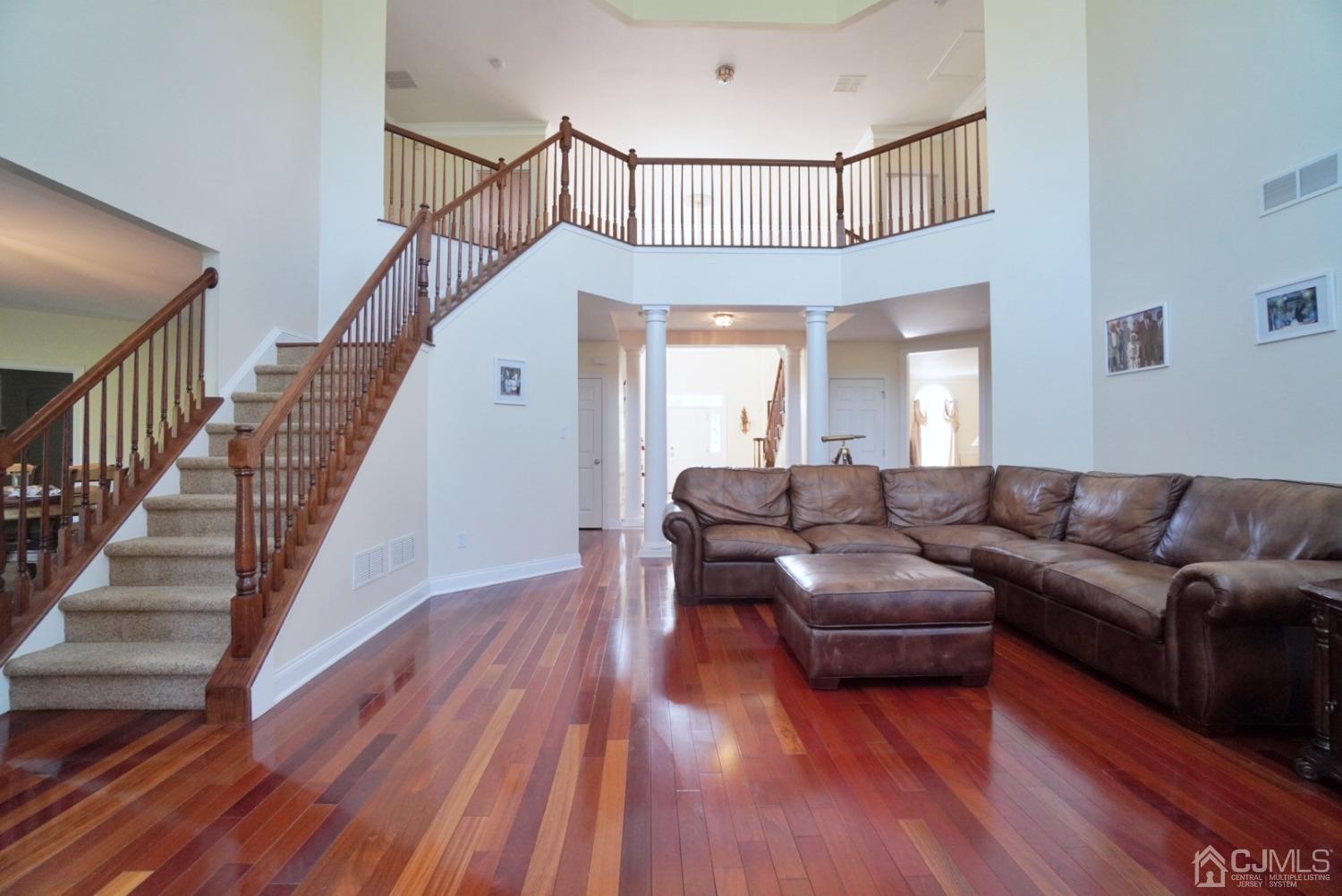 12 High Ridge Lane Augusta, NJ 07822 - Photo 24 of 49 a living room with furniture and a wooden floor