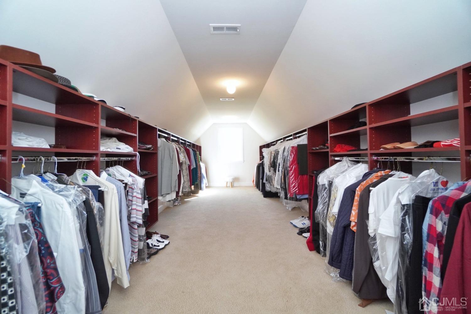 12 High Ridge Lane Augusta, NJ 07822 - Photo 35 of 49 a view of walk in closet with clothes and shoes