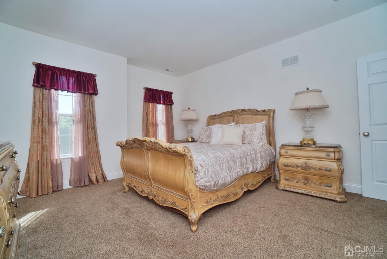 12 High Ridge Lane Augusta, NJ 07822 - Photo 36 of 49 a bedroom with a bed and a couch