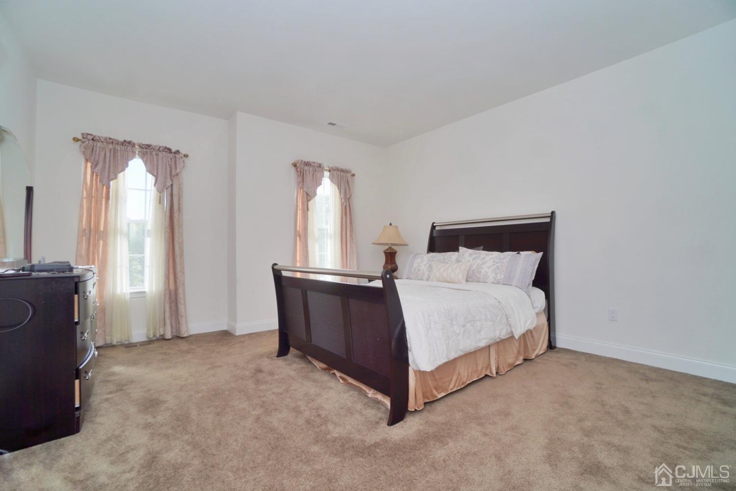12 High Ridge Lane Augusta, NJ 07822 - Photo 37 of 49 a bed sitting in a room next to a window