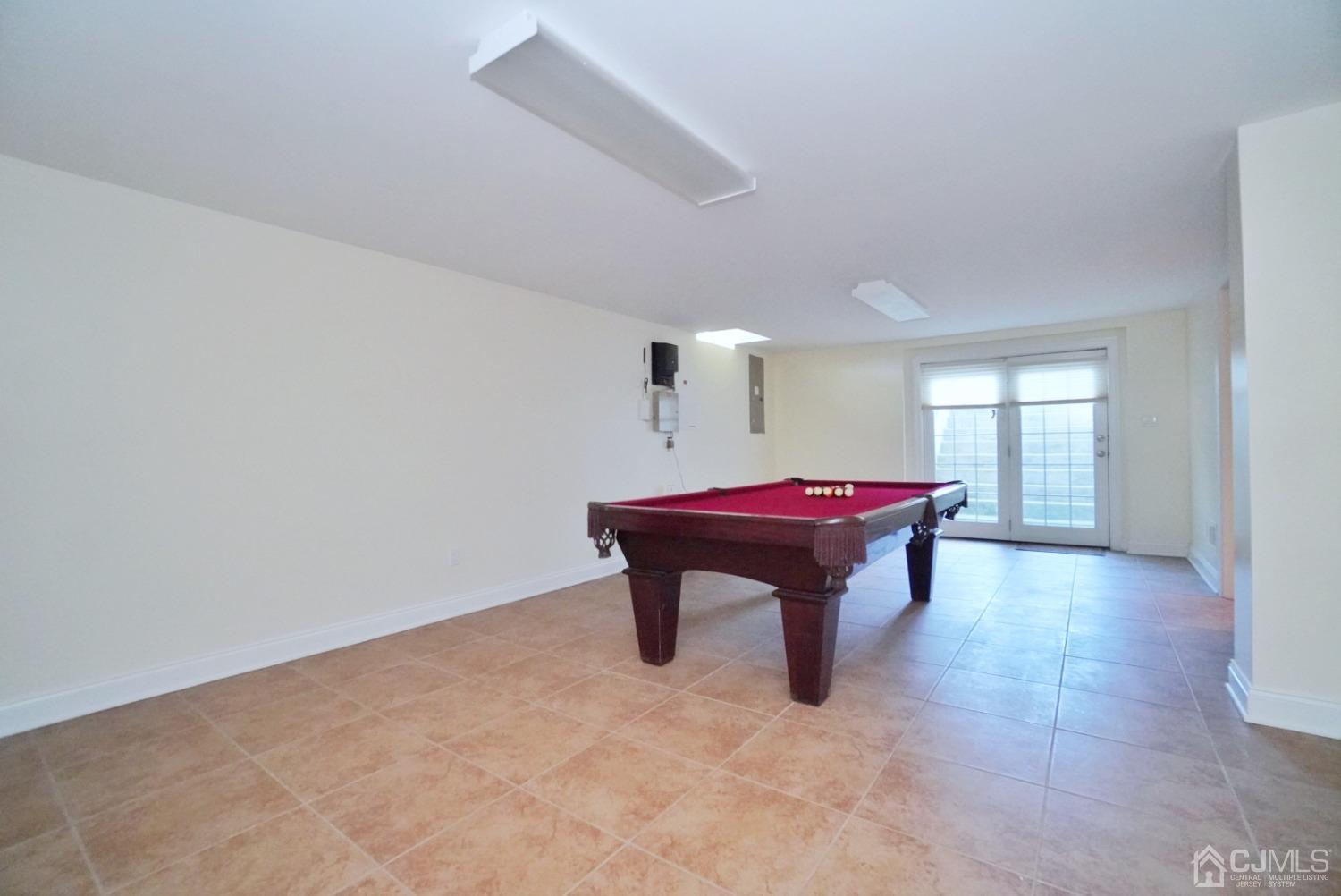 12 High Ridge Lane Augusta, NJ 07822 - Photo 39 of 49 a room with pool table and windows