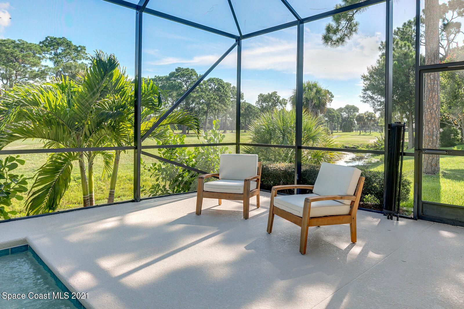 1398 Outrigger Circle Rockledge, FL 32955 - Photo 16 of 51 a view of a chairs and table in patio