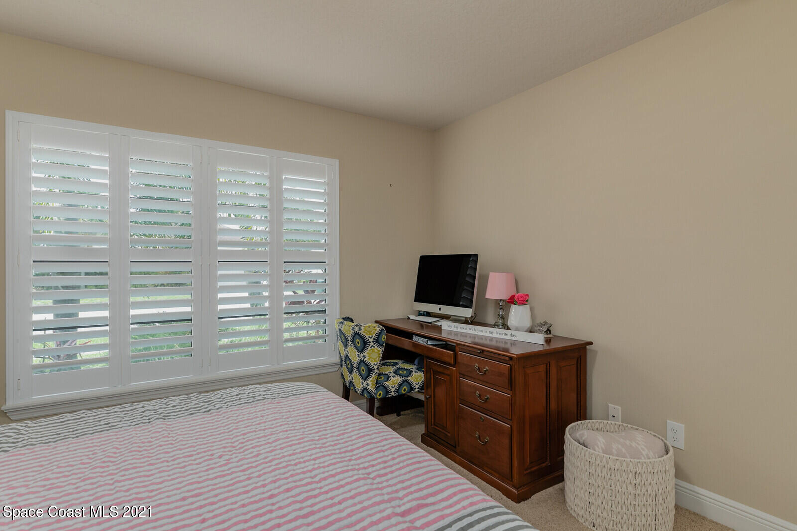 1398 Outrigger Circle Rockledge, FL 32955 - Photo 23 of 51 a room with a bed and furniture