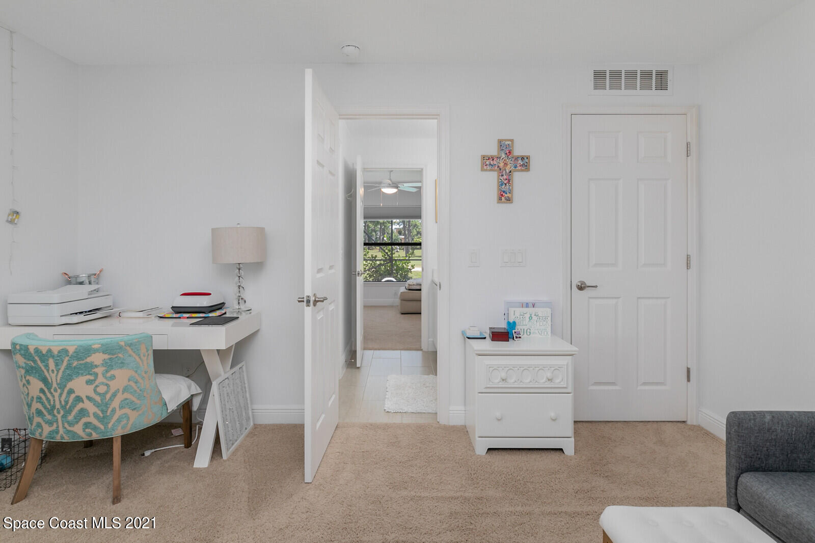 1398 Outrigger Circle Rockledge, FL 32955 - Photo 28 of 51 a living room with furniture and a table