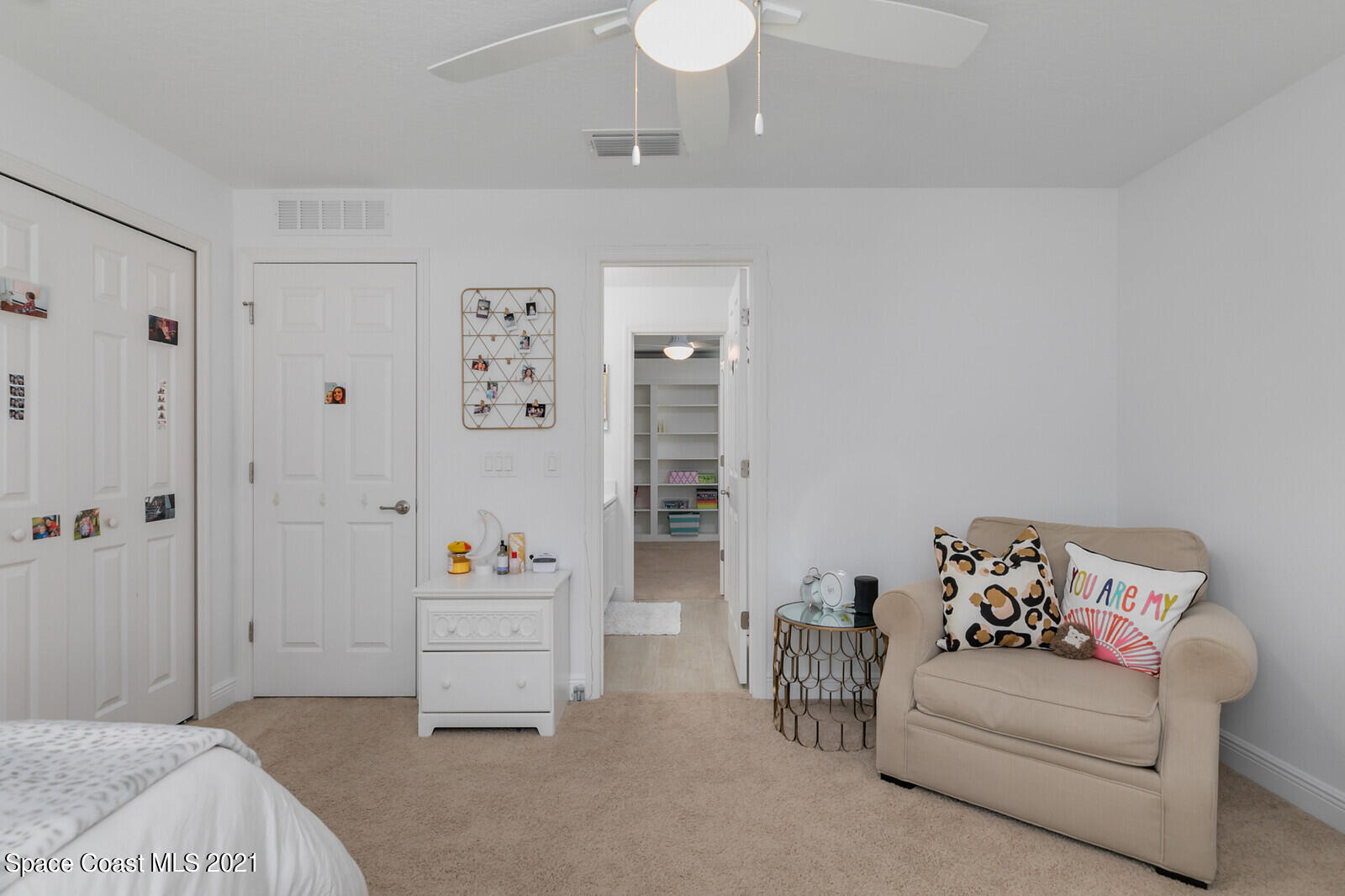 1398 Outrigger Circle Rockledge, FL 32955 - Photo 31 of 51 a bedroom with furniture and a potted plant