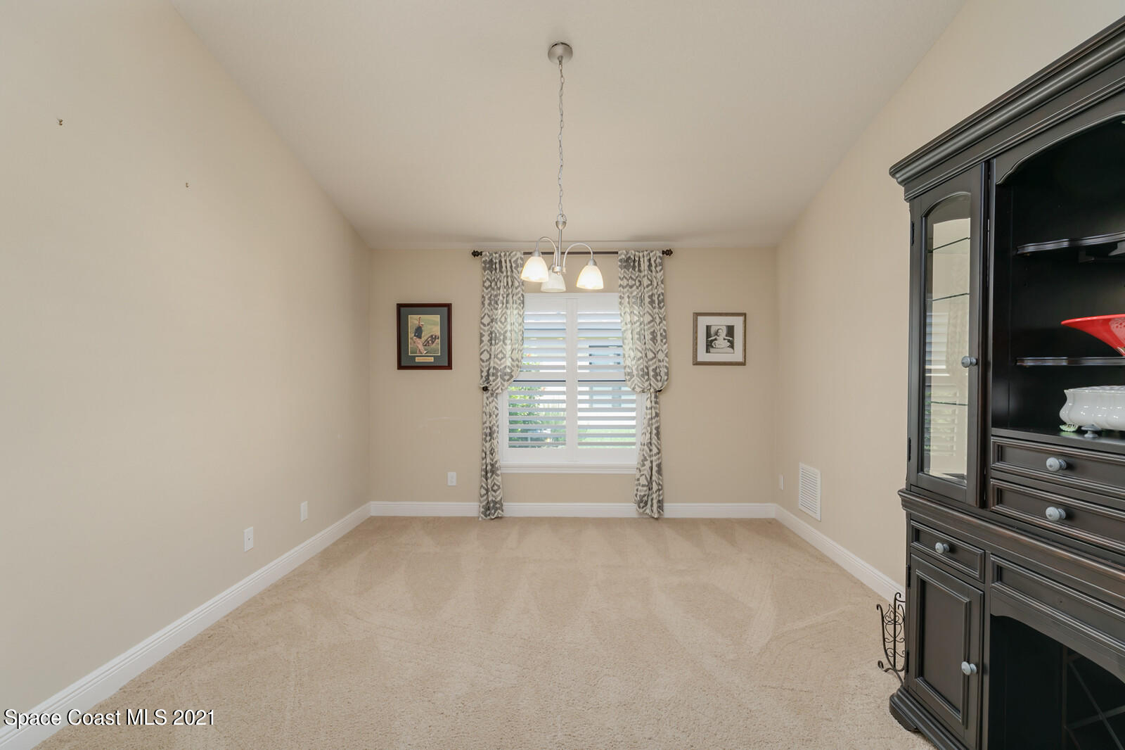 1398 Outrigger Circle Rockledge, FL 32955 - Photo 32 of 51 a view of an empty room with a fireplace