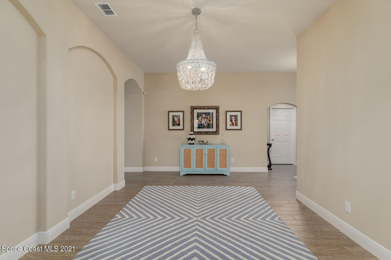 1398 Outrigger Circle Rockledge, FL 32955 - Photo 33 of 51 a bedroom with a bed and a window