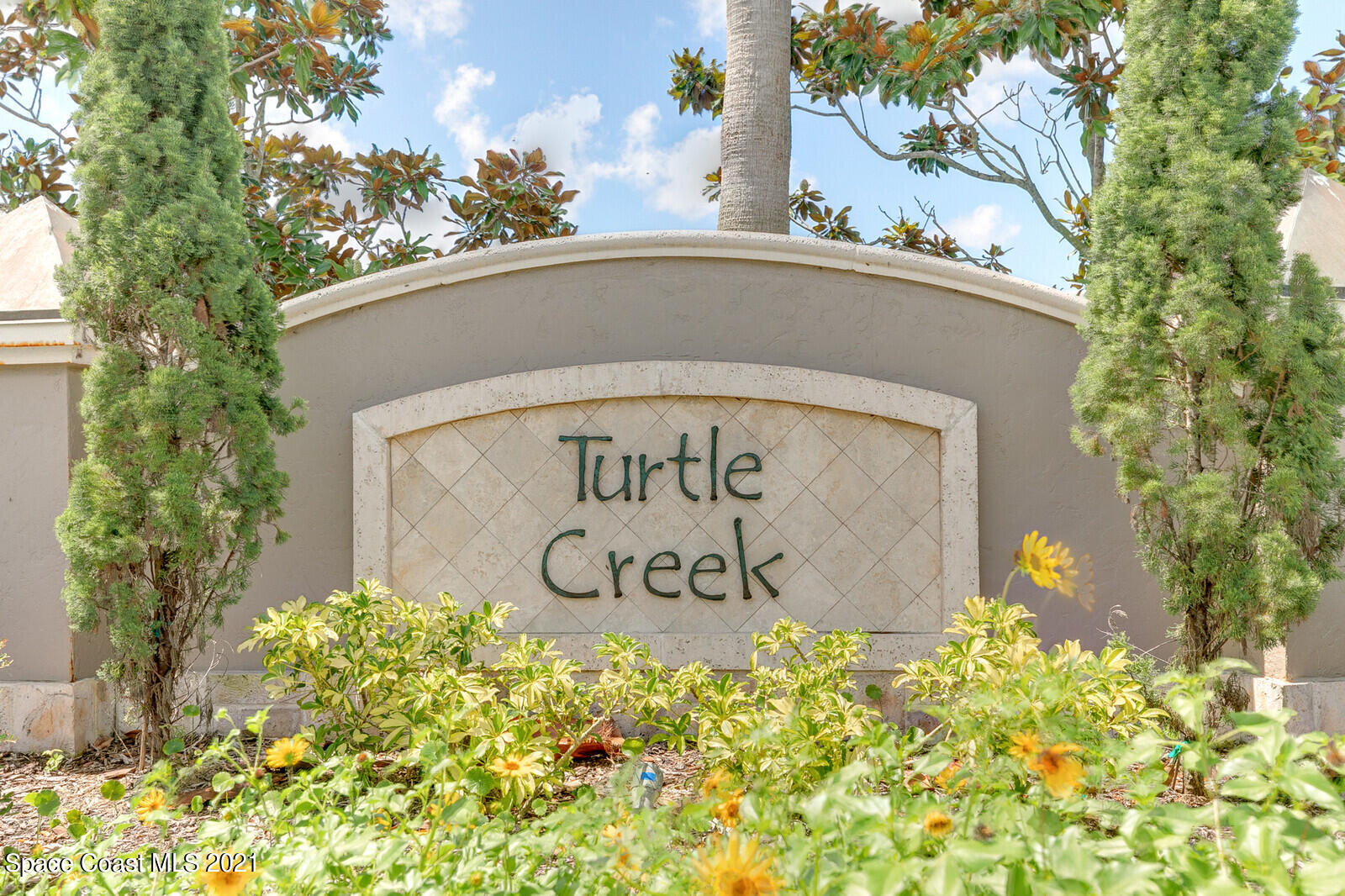 1398 Outrigger Circle Rockledge, FL 32955 - Photo 45 of 51 a sign on the side of a building