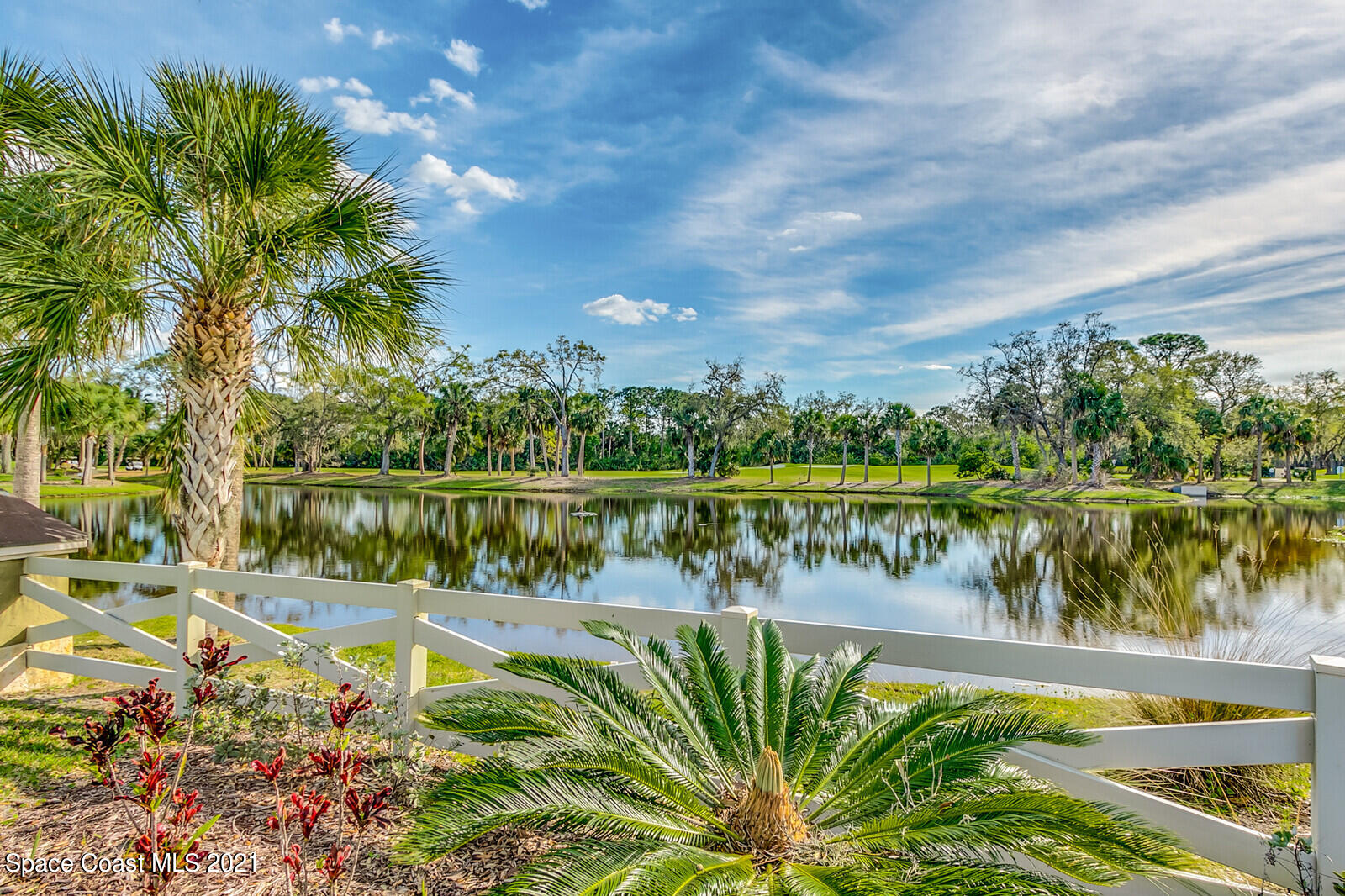 1398 Outrigger Circle Rockledge, FL 32955 - Photo 47 of 51 a view of a lake with a beach