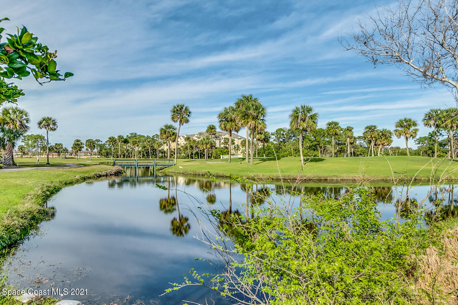 1398 Outrigger Circle Rockledge, FL 32955 - Photo 51 of 51 a view of a lake with a big yard