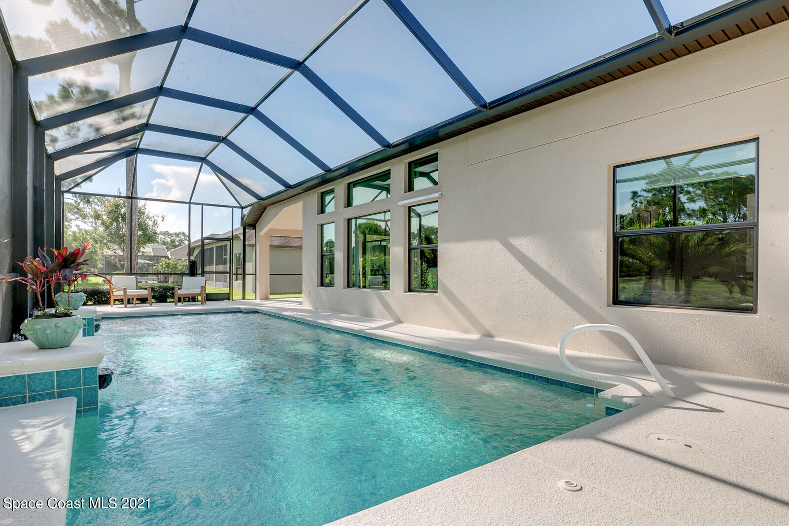 1398 Outrigger Circle Rockledge, FL 32955 - Photo 9 of 51 a view of a patio with a table and chairs