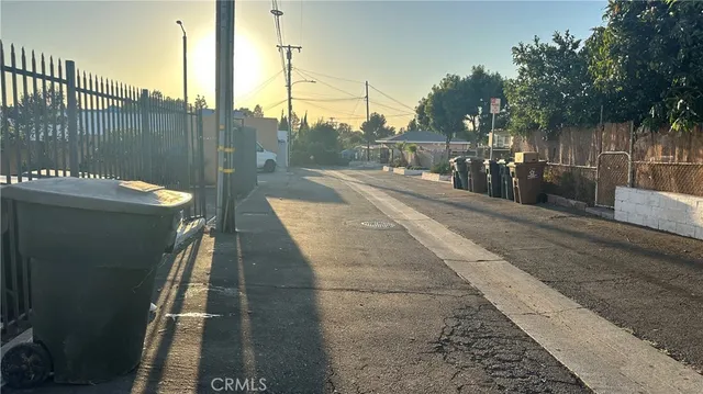 a view of a pathway with a balcony