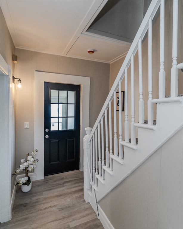 9 Ladd Street Springfield, MA 01109 - Photo 8 of 25 a view of entryway and hall with wooden floor