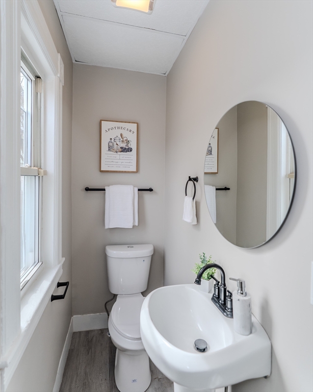9 Ladd Street Springfield, MA 01109 - Photo 9 of 25 a bathroom with a toilet and sink