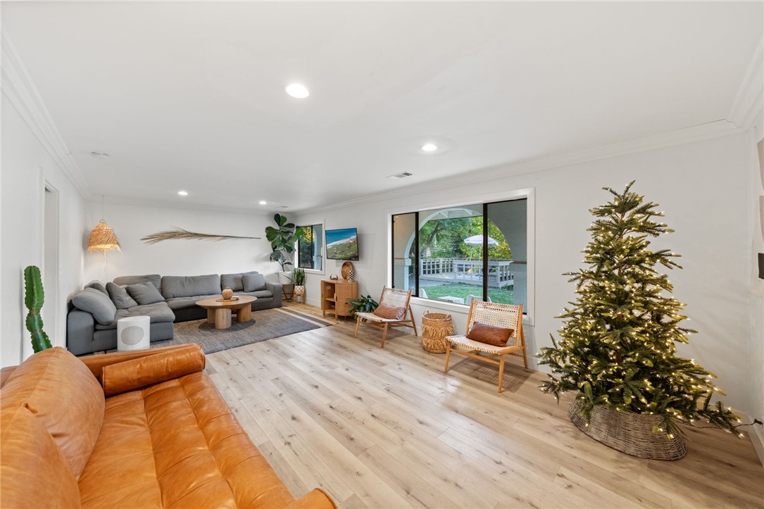 736 Del Valle Drive Fallbrook, CA 92028 - Photo 13 of 53 a living room with furniture and a christmas tree