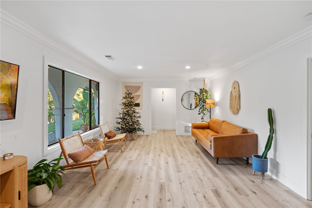 736 Del Valle Drive Fallbrook, CA 92028 - Photo 14 of 53 a living room with furniture and wooden floor