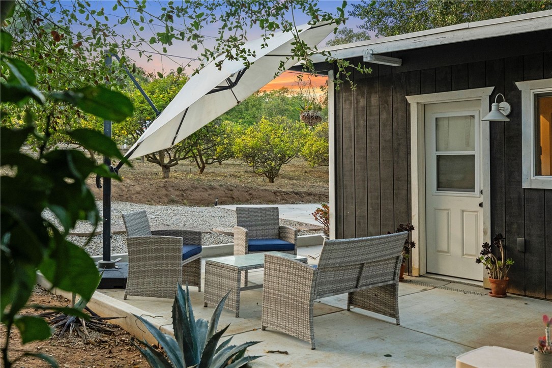 736 Del Valle Drive Fallbrook, CA 92028 - Photo 40 of 53 a view of backyard with outdoor seating and plants
