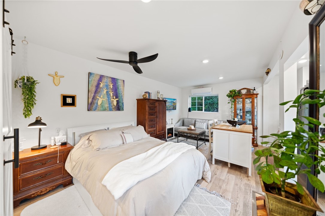 736 Del Valle Drive Fallbrook, CA 92028 - Photo 43 of 53 a bedroom with furniture and a potted plant