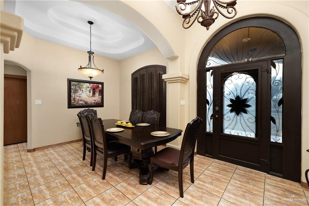 704 Goodwin Acres Road Mission, TX 78574 - Photo 4 of 26 a dining room with furniture and window