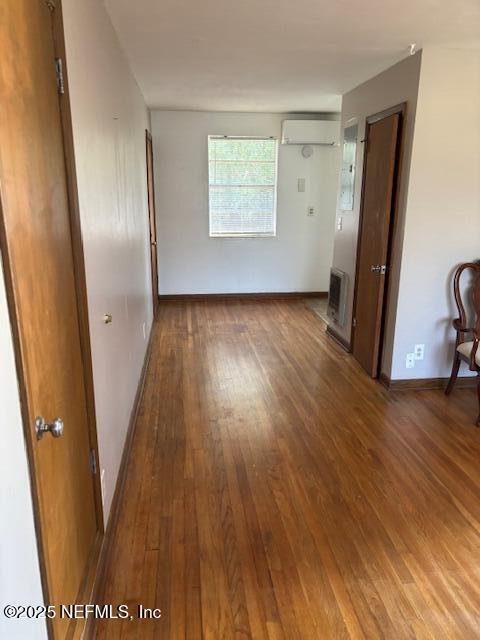 2898 Olga Place, Unit 3 Jacksonville, FL 32205 - Photo 3 of 8 wooden floor in an empty room with a window