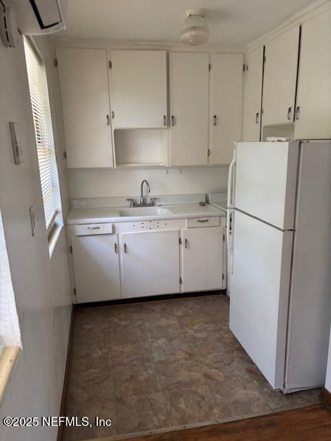 2898 Olga Place, Unit 3 Jacksonville, FL 32205 - Photo 4 of 8 a kitchen with stainless steel appliances a refrigerator sink and cabinets