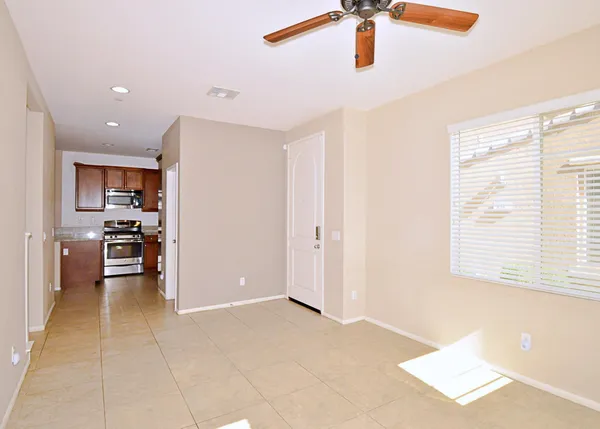 a view of kitchen with furniture and window