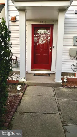 a front view of a house with yard