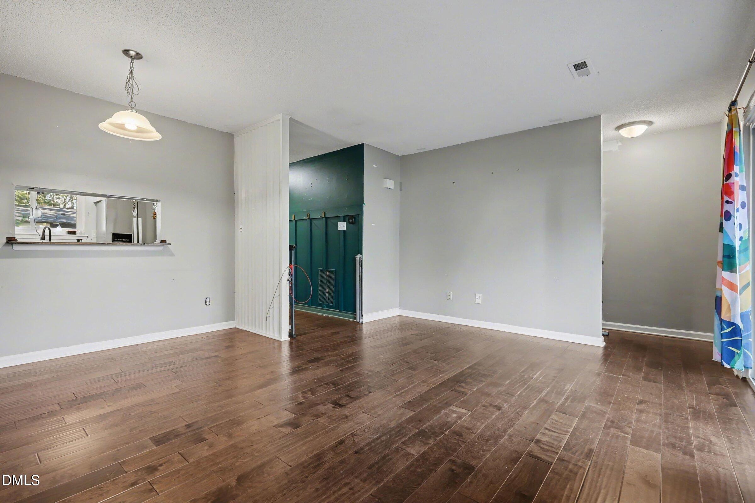 4271 Lake Ridge Drive Raleigh, NC 27604 - Photo 10 of 36 a view of an empty room with closet and a window